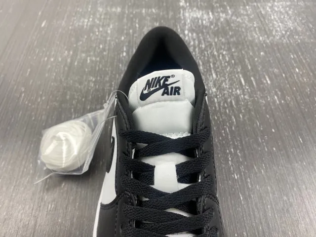 Nike Air Jordan 1 Low White and Black Lifestyle Sneakers 9