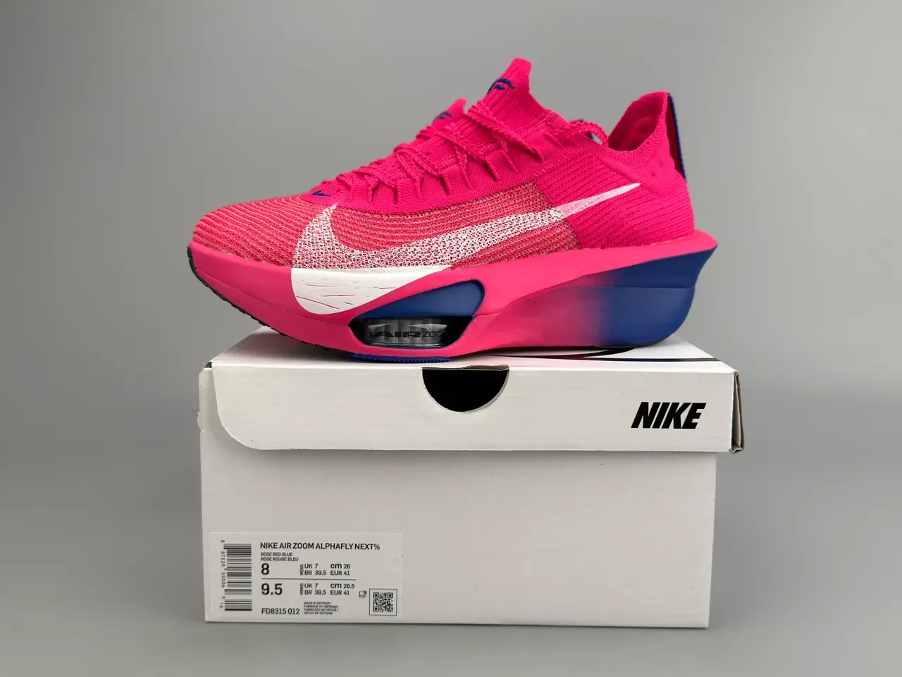 Nike Air Zoom Alphafly Tênis de Corrida Rosa Azul Superior em Malha Unidade Visível 2