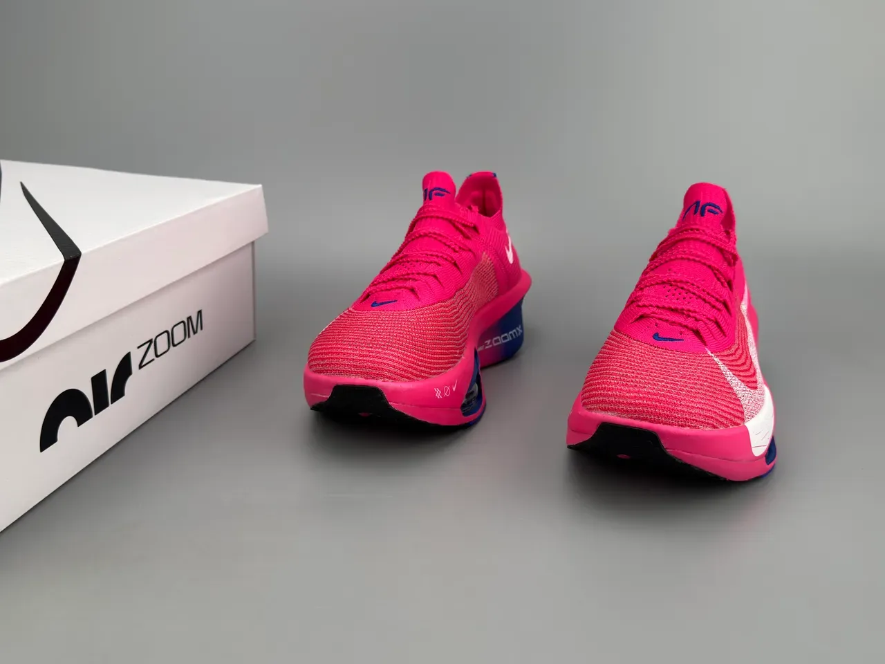Nike Air Zoom Alphafly Tênis de Corrida Rosa Azul Superior em Malha Unidade Visível 3