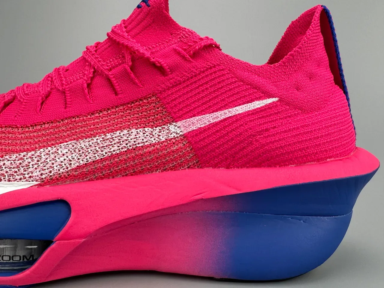 Nike Air Zoom Alphafly Tênis de Corrida Rosa Azul Superior em Malha Unidade Visível 5