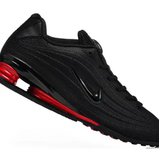 Nike Chaussures de running noires rouges avec tige en maille et amortissement de ressort exposé