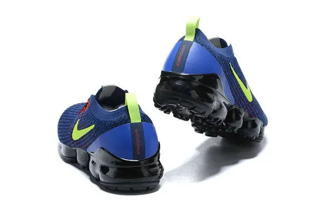 Nike Tênis de corrida com upper de knit azul e verde Air Cushioning visível 4