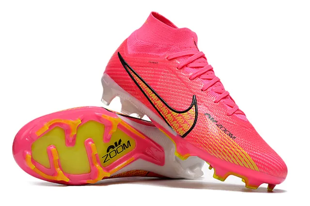 Nike Phantom GT Chaussures de football rose jaune à empeigne de maille haute, crampons coniques moulés pour terrain ferme 4