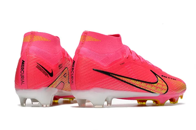 Nike Phantom GT Chaussures de football rose jaune à empeigne de maille haute, crampons coniques moulés pour terrain ferme 5