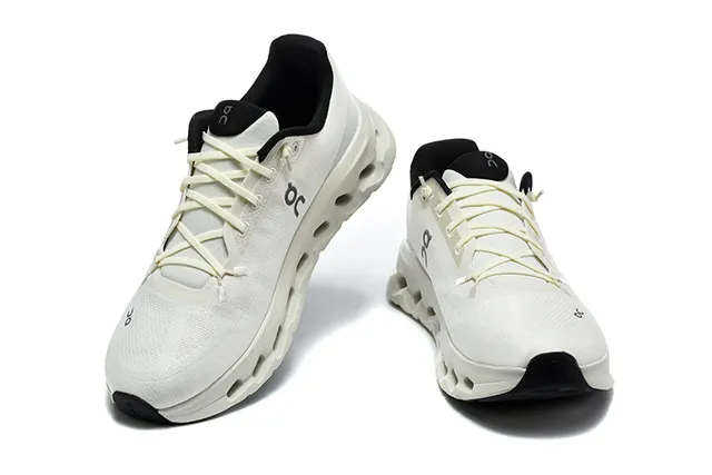 On Cloudmonster Beige and Black Running Shoes 3