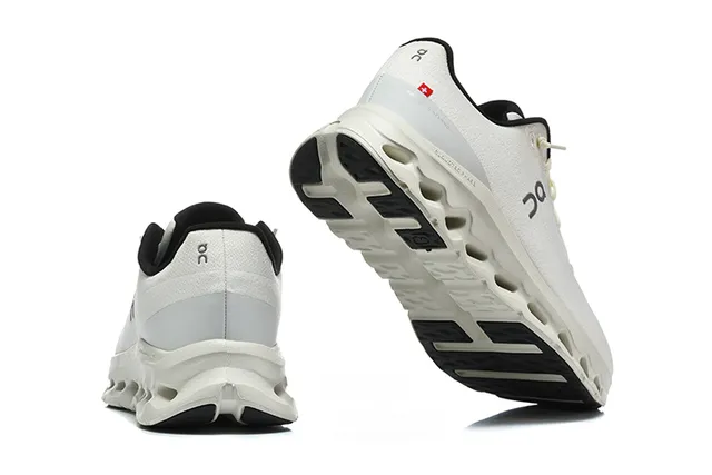 On Cloudmonster Beige and Black Running Shoes 4