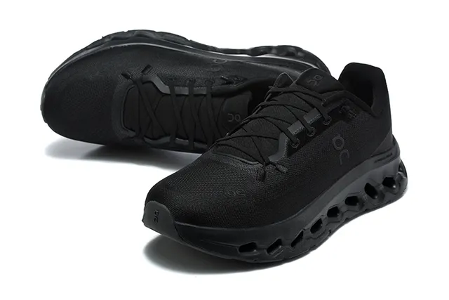 On Cloudmonster Beige and Black Running Shoes 11