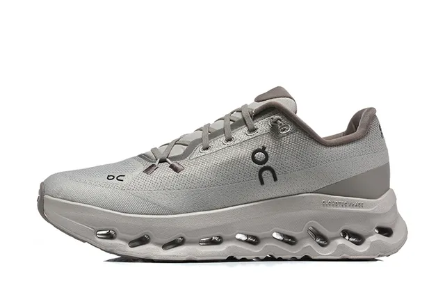 On Cloudmonster Beige and Black Running Shoes 22