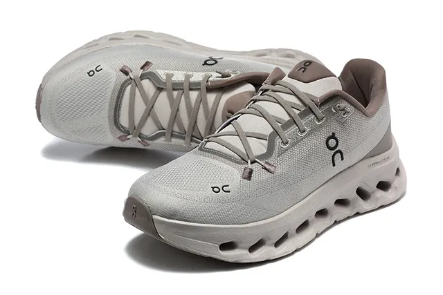 On Cloudmonster Beige and Black Running Shoes 23