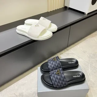 Prada Cloudbust Slides White and Black ज्यामितीय पट्टी चप्पल