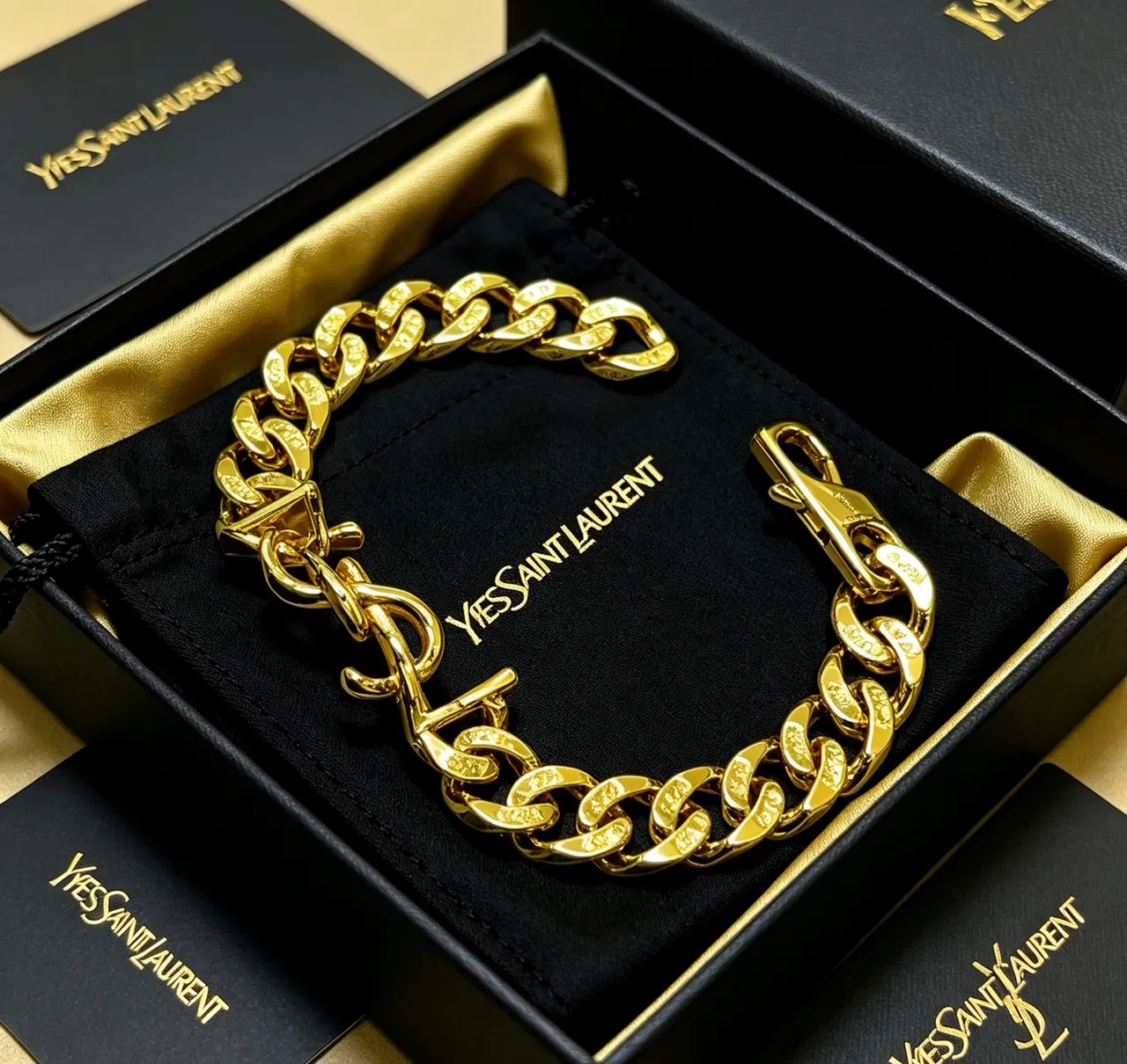 Saint Laurent bracelet or noir chaîne chunky curb-link fermoir monogram 5