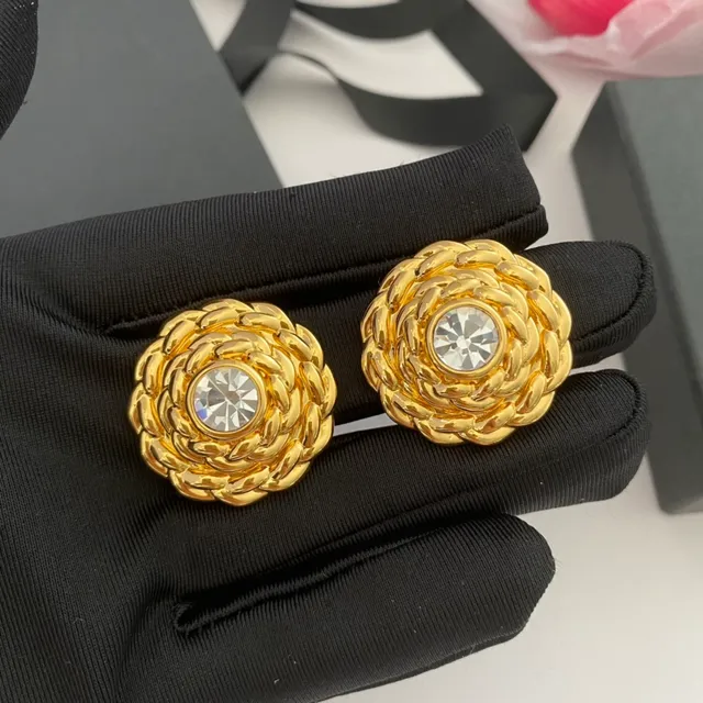 Saint Laurent Boucles d'oreilles à Cristal Dorées Tordues en Corde 9
