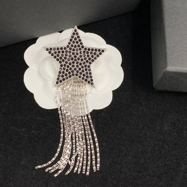 Saint Laurent boucles d'oreilles en cristal pavé frange étoilée 4