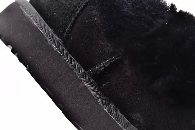 UGG Nita Black Shearling-Lined Slip-On Casual Shoes 6
