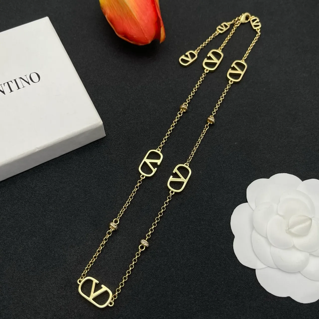 Collier Valentino VLogo Chaîne Or Argent Motifs Ouverts 7