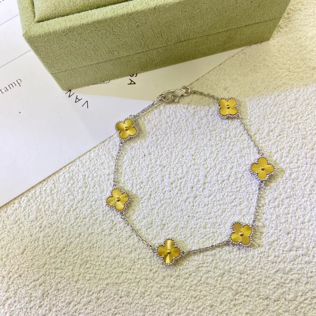 Van Cleef & Arpels Alhambra Five Motif Pulsera de oro y plata 3
