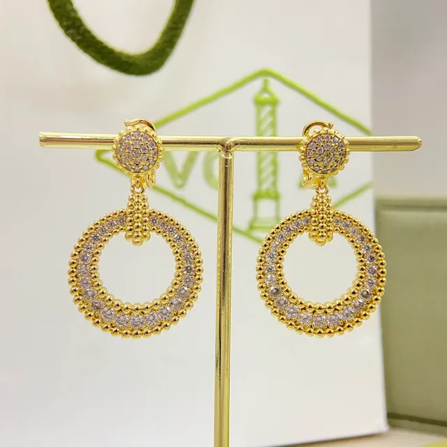 Van Cleef & Arpels Pavé Crystal Circular Drop Earrings 8