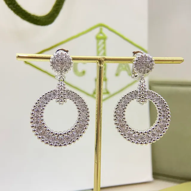 Van Cleef & Arpels Pavé Crystal Circular Drop Earrings 9