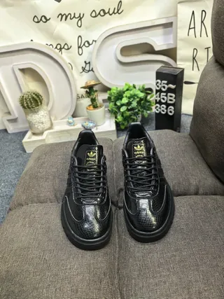 Adidas Black Gold Textured Upper Accent Sneakers 10