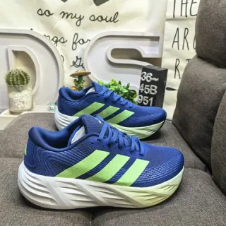 Adidas chaussures de running à tige en tricot bleu vert avec panneau latéral à trois rayures