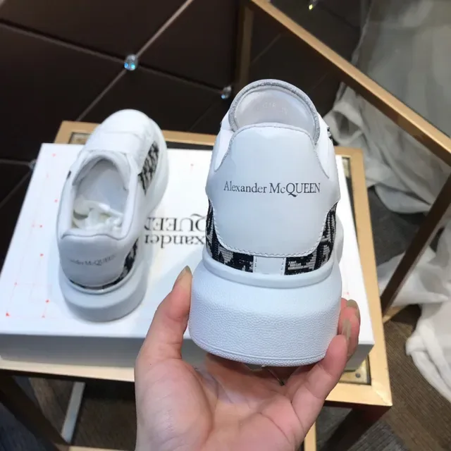 Alexander McQueen Oversized Sneaker White Black Platform Sole Monogrammed Textile Side Panel Lifestyle Sneakers 2
