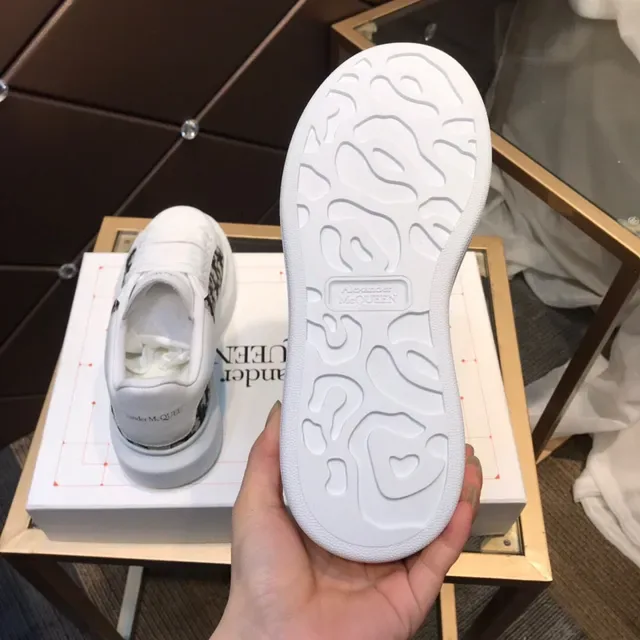 Alexander McQueen Oversized Sneaker White Black Platform Sole Monogrammed Textile Side Panel Lifestyle Sneakers 4