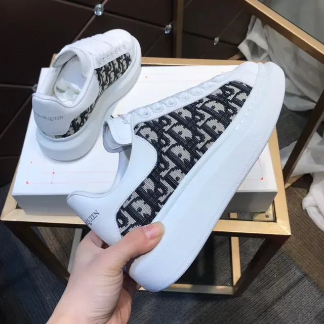 Alexander McQueen Oversized Sneaker White Black Platform Sole Monogrammed Textile Side Panel Lifestyle Sneakers 5
