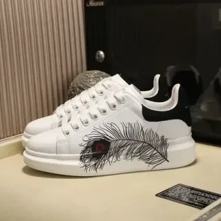Alexander McQueen Oversized Sneaker White Black Silhouette Peacock Feather Graphic Lifestyle Sneakers