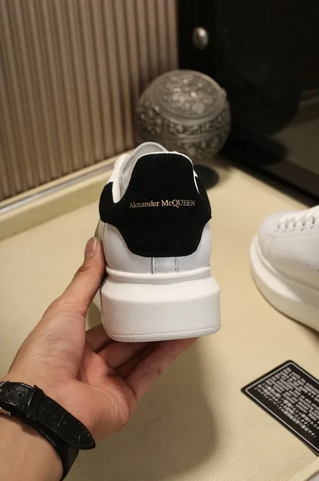 Alexander McQueen Oversized Sneaker White Black Silhouette Peacock Feather Graphic Lifestyle Sneakers 2