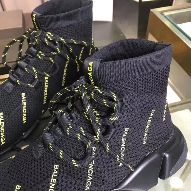 Balenciaga Speed Trainer tênis lifestyle preto e amarelo com logo knit 4