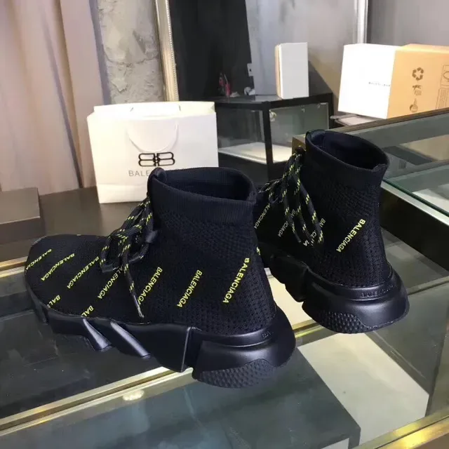 Balenciaga Speed Trainer tênis lifestyle preto e amarelo com logo knit 5