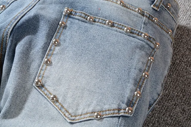 Balmain Studded Distressed Light-Wash Jeans 2