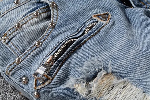 Balmain Studded Distressed Light-Wash Jeans 6