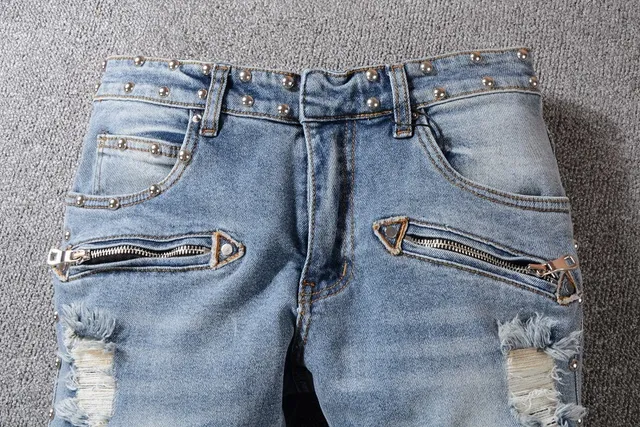 Balmain Studded Distressed Light-Wash Jeans 9