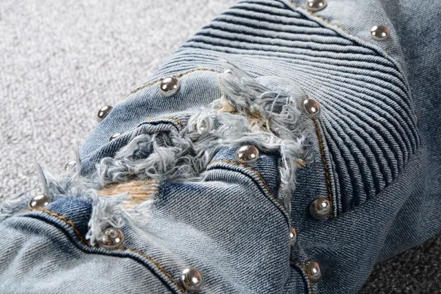 Balmain Studded Distressed Light-Wash Jeans 10