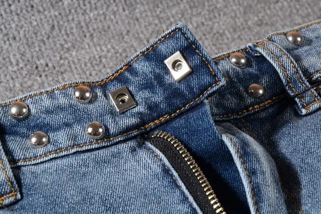 Balmain Studded Distressed Light-Wash Jeans 11