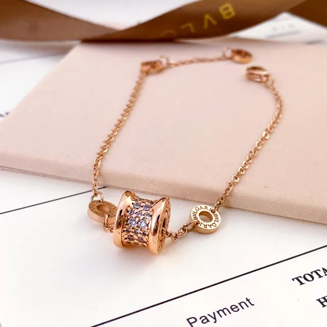 Bvlgari B.zero1 سوار ذهبي فضي تعويذة أسطوانية برميلية إعداد بافيه للكريستال 2