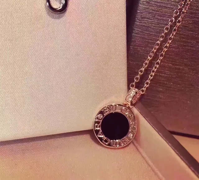 Bvlgari B.zero1 فضي أسود دائري Logo-Engraved قلادة مركز حجر كابوشون 6