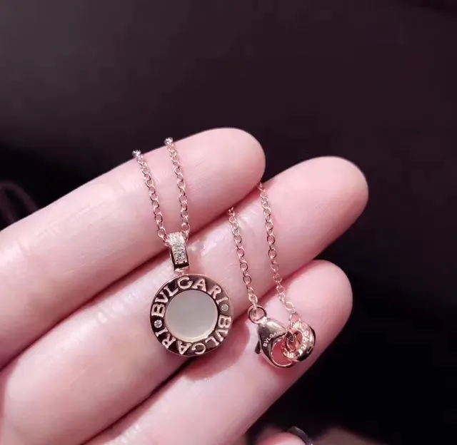 Bvlgari B.zero1 فضي أسود دائري Logo-Engraved قلادة مركز حجر كابوشون 8