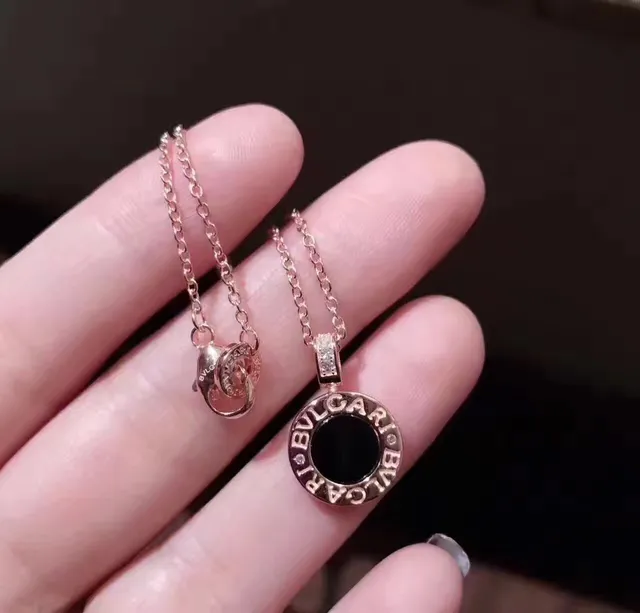 Bvlgari B.zero1 فضي أسود دائري Logo-Engraved قلادة مركز حجر كابوشون 9