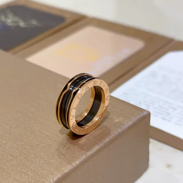 Bvlgari Gold Black Triple-Band Rotating Ring 7