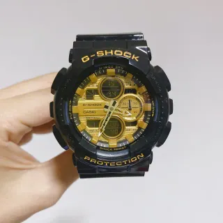 Casio G-Shock GA-100 Black and Gold Sports Watch