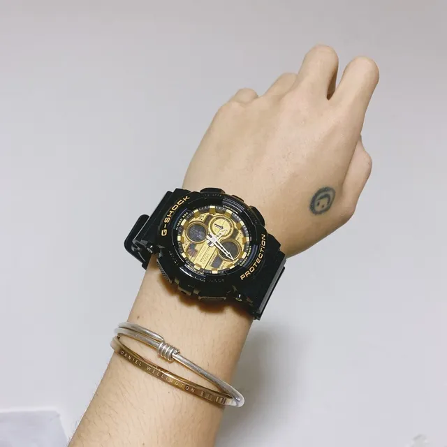 Casio G-Shock GA-100 Relógio Esportivo Preto e Dourado 3