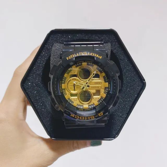 Casio G-Shock GA-100 Relógio Esportivo Preto e Dourado 4