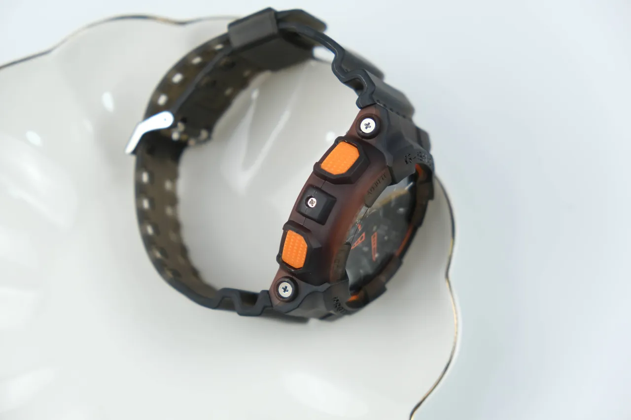 Casio G-Shock GA-100 ساعة رياضية أسود شفاف برتقالي 4