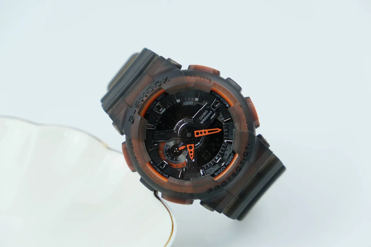 Casio G-Shock GA-100 ساعة رياضية أسود شفاف برتقالي 5