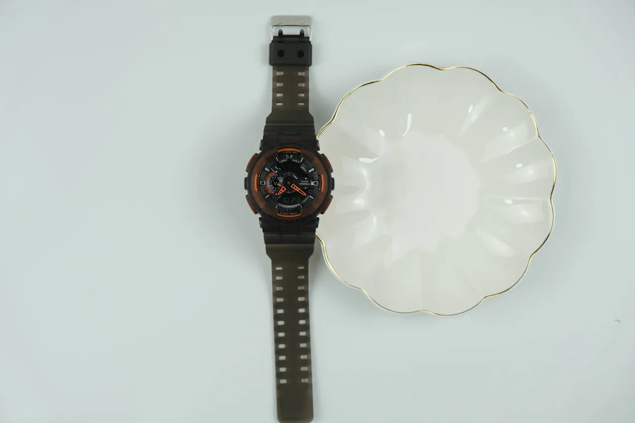Casio G-Shock GA-100 ساعة رياضية أسود شفاف برتقالي 7