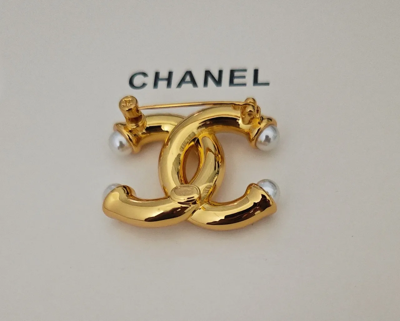 Chanel CC Brooch Gold White Interlocking Motif Metal Brooch 2