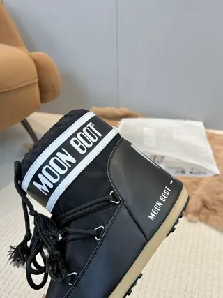 Bottes de neige isolées à lacets noir et crème 3