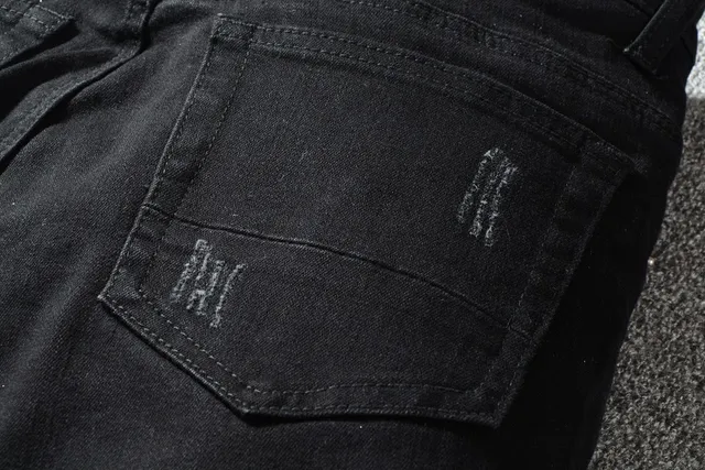 Black Distressed Patchwork Riveted Jeans 4